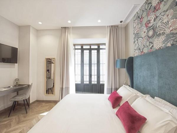 Soho Boutique Sevilla : photo 1 de la chambre chambre triple standard
