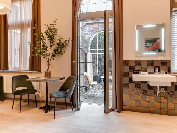 Brasss Hotel Suites : photo 4 de la chambre suite de luxe roodbaars