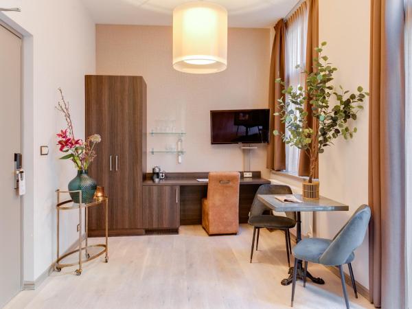 Brasss Hotel Suites : photo 6 de la chambre suite de luxe roodbaars