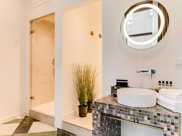 Brasss Hotel Suites : photo 2 de la chambre suite deluxe savannah