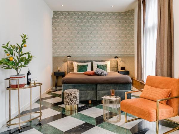 Brasss Hotel Suites : photo 4 de la chambre suite deluxe savannah