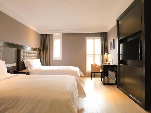 Jinjiang Metropolo Hotel Classic Nanjing Road (East) Shanghai : photo 1 de la chambre chambre lits jumeaux ultra sassy