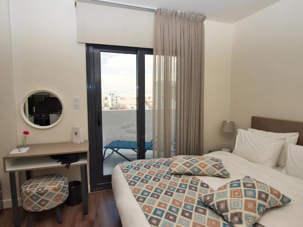 Urban Nest - Suites & Apartments : photo 8 de la chambre suite avec balcon