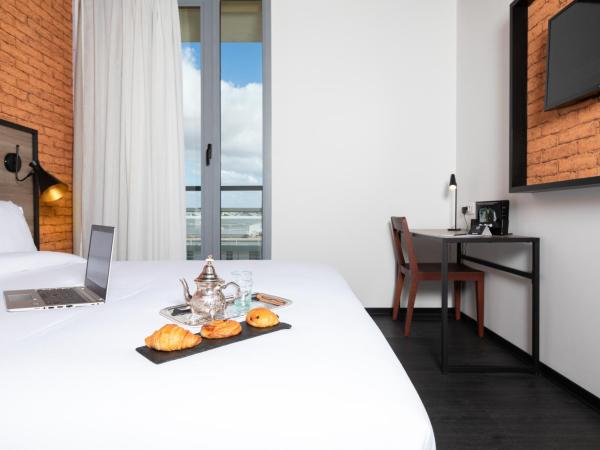 ONOMO Airport Casablanca : photo 1 de la chambre chambre lit queen-size supérieure - vue sur jardin