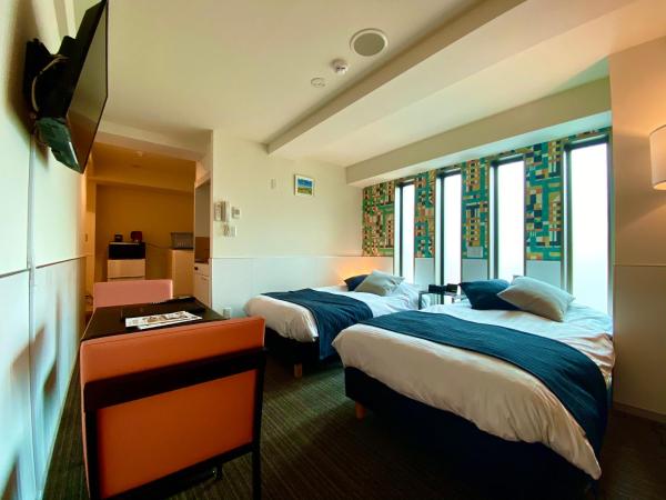 Residence Condominium KALAHAAI : photo 1 de la chambre chambre lits jumeaux deluxe