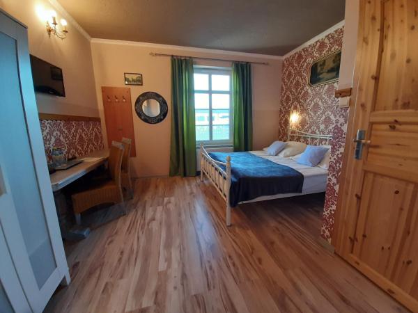 Dworek Bursztynowe Piaski : photo 7 de la chambre chambre double ou lits jumeaux