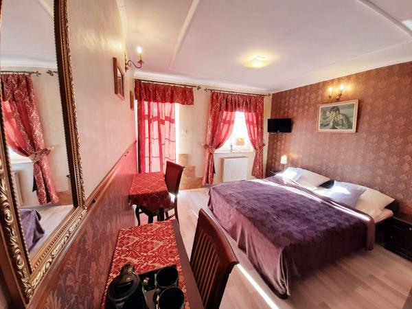 Dworek Bursztynowe Piaski : photo 6 de la chambre chambre double ou lits jumeaux