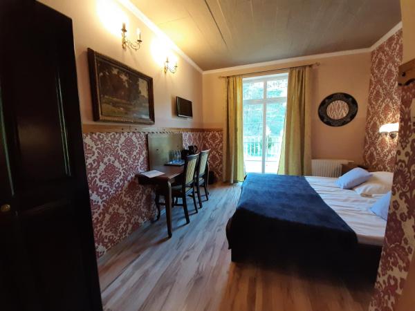 Dworek Bursztynowe Piaski : photo 6 de la chambre chambre double ou lits jumeaux standard