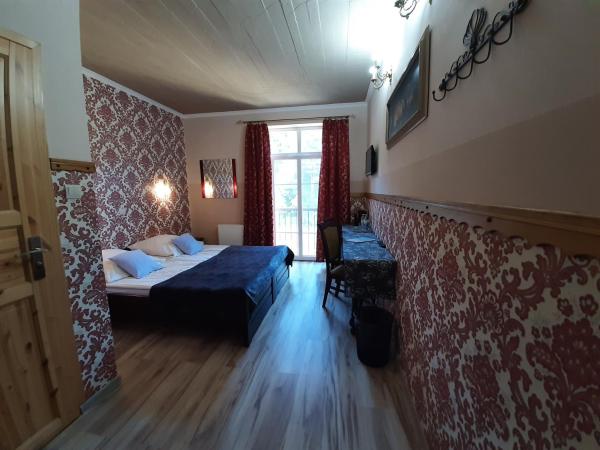 Dworek Bursztynowe Piaski : photo 2 de la chambre chambre double ou lits jumeaux standard