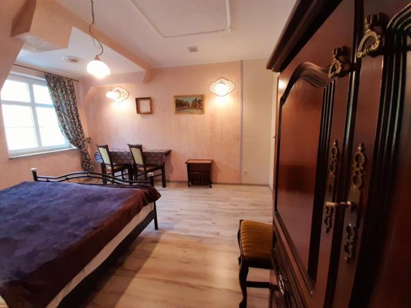Dworek Bursztynowe Piaski : photo 4 de la chambre suite familiale