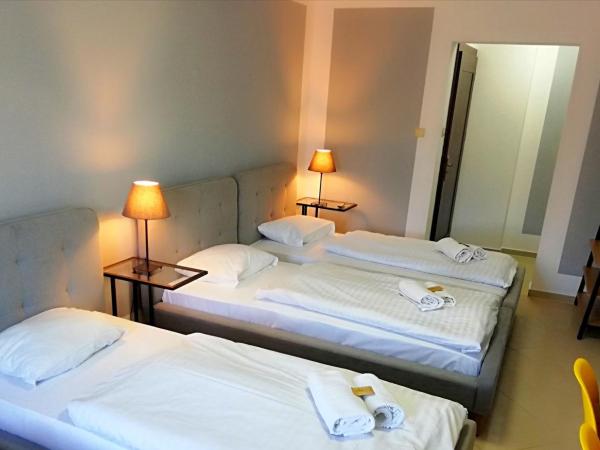 Great Polonia Wrocław City Center : photo 6 de la chambre chambre quadruple