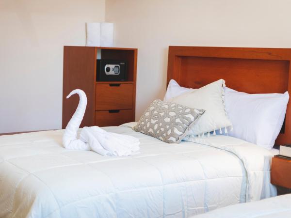 La Lola Hotel & Suites : photo 4 de la chambre chambre deluxe
