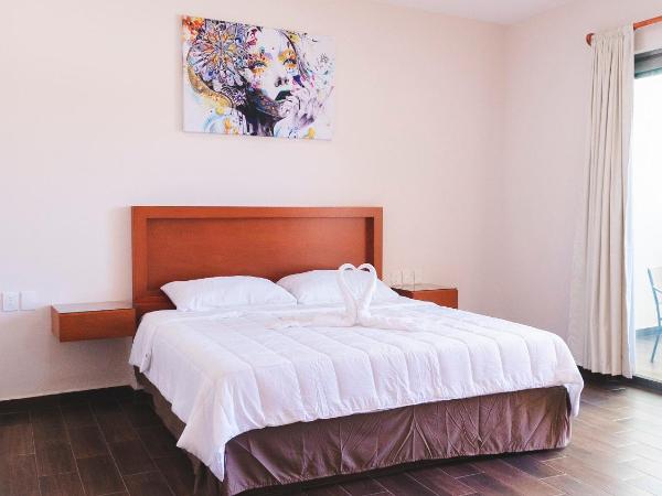 La Lola Hotel & Suites : photo 4 de la chambre suite deluxe avec lit king-size