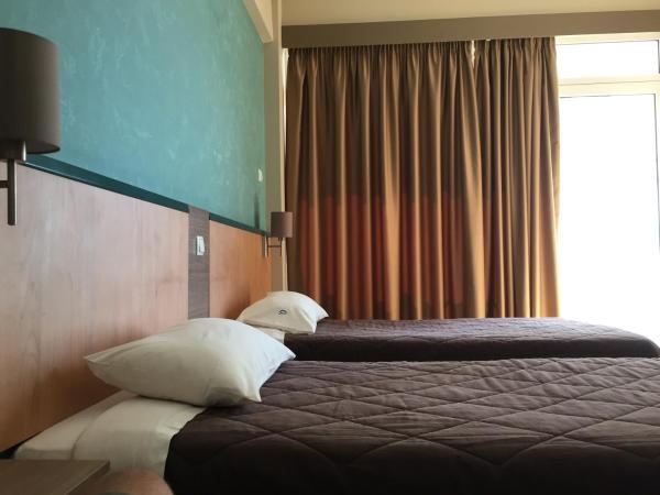 Hotel Ostria : photo 2 de la chambre chambre quadruple avec balcon 