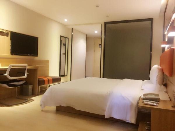 7Days Premium Shenzhen Longgang Dayun Metro Station : photo 1 de la chambre chambre supérieure lit queen-size
