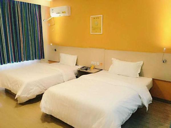 7Days Inn Suzhou Xuguan : photo 1 de la chambre chambre lits jumeaux confortable