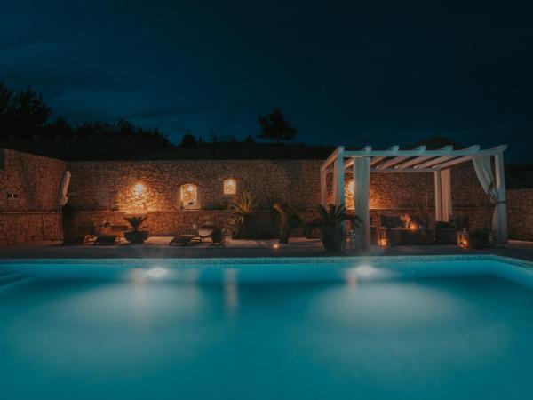 The Residence : photo 8 de la chambre appartement 1 chambre - vue sur lac et jardin