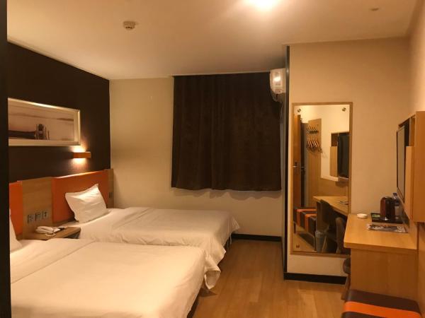 7Days Premium Nanjing Xinjiekou Zhangfu Garden Metro Station : photo 5 de la chambre chambre lits jumeaux de luxe premium