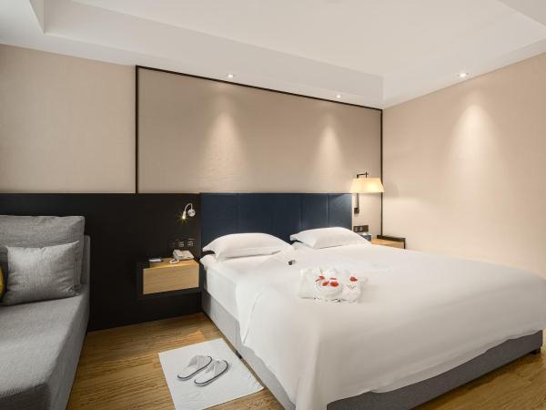 成都V hotel精品酒店 : photo 3 de la chambre deluxe movie suite 