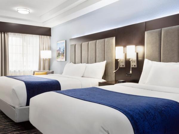 Days Inn & Suites by Wyndham Houston Hobby Airport : photo 3 de la chambre suite 1 lit king-size et 1 lit double - non-fumeurs