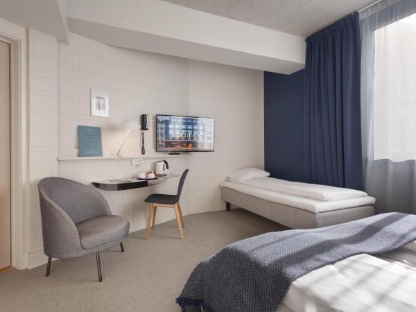 Zander K Hotel : photo 1 de la chambre chambre lits jumeaux familiale