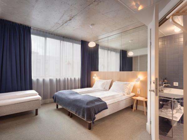 Zander K Hotel : photo 2 de la chambre chambre lits jumeaux familiale