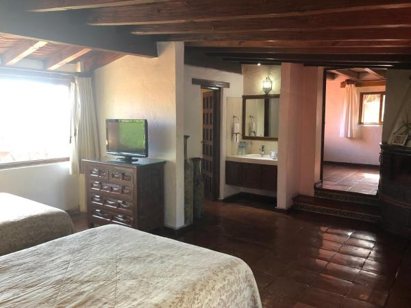 Villa San Jose Hotel & Suites : photo 3 de la chambre chambre double deluxe - vue sur ville