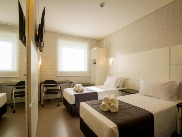 Hotel Confiance Barigui : photo 3 de la chambre chambre lits jumeaux standard