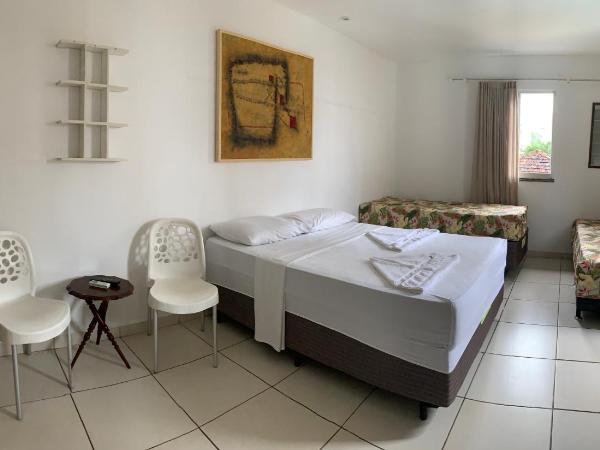 Porto das Palmeiras Hostel : photo 1 de la chambre chambre quadruple Économique avec salle de bains commune