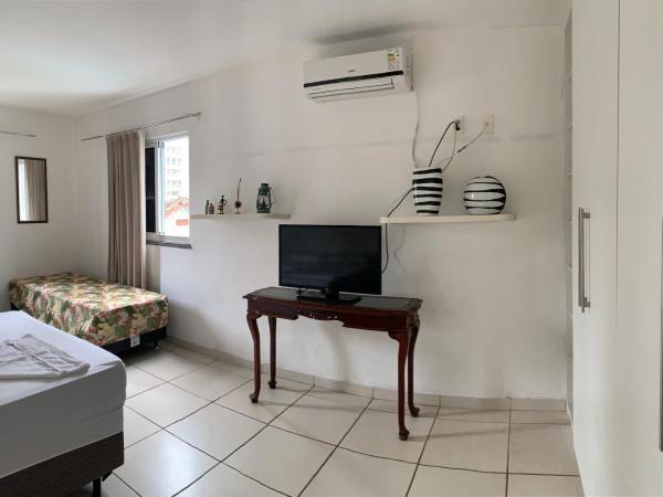 Porto das Palmeiras Hostel : photo 2 de la chambre chambre quadruple Économique avec salle de bains commune