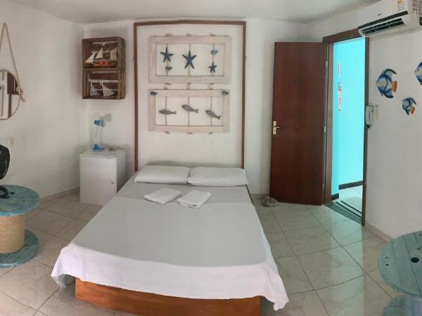Porto das Palmeiras Hostel : photo 1 de la chambre chambre double avec toilettes communes