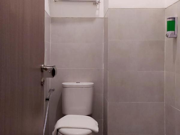 Front One Residence Syariah Mampang : photo 1 de la chambre chambre simple Économique