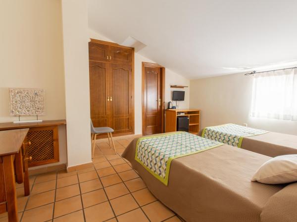Hostal El Gallo : photo 1 de la chambre chambre lits jumeaux avec salle de bains privative