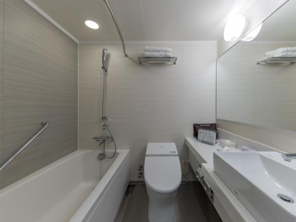 JR Kyushu Hotel Blossom Hakata Central : photo 1 de la chambre chambre triple - non-fumeurs