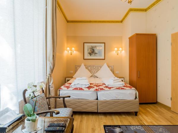 Parlamento Rooms : photo 1 de la chambre chambre familiale adaptée aux personnes à mobilité réduite