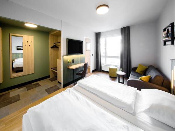 fjord hotel berlin : photo 2 de la chambre chambre familiale