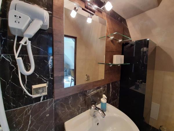 Dworek Bursztynowe Piaski : photo 2 de la chambre suite familiale