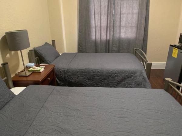 Orange Village Hostel : photo 8 de la chambre chambre lits jumeaux avec douche 