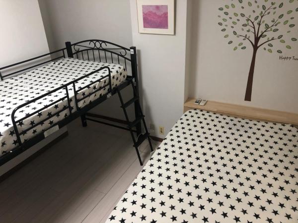 Yasuragi Nakasu : photo 3 de la chambre chambre lits jumeaux avec douche