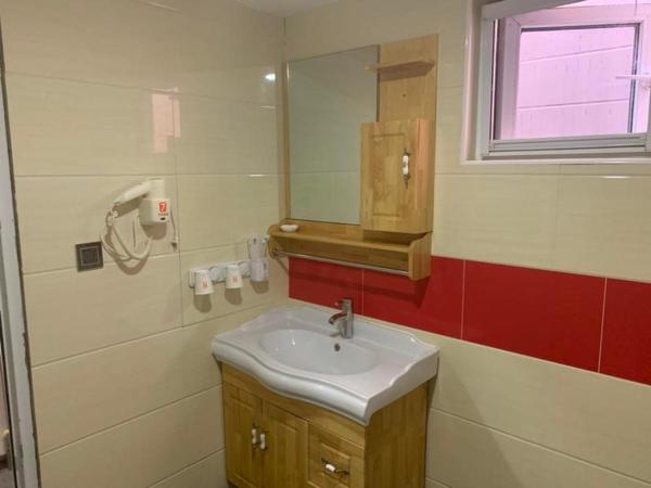 7Days Premium Beijing Gulou : photo 1 de la chambre chambre lits jumeaux/double