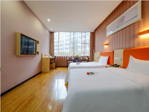 7Days Premium Chongqing Jiefangbei Pedestrian Street Branch : photo 1 de la chambre chambre lits jumeaux supérieure