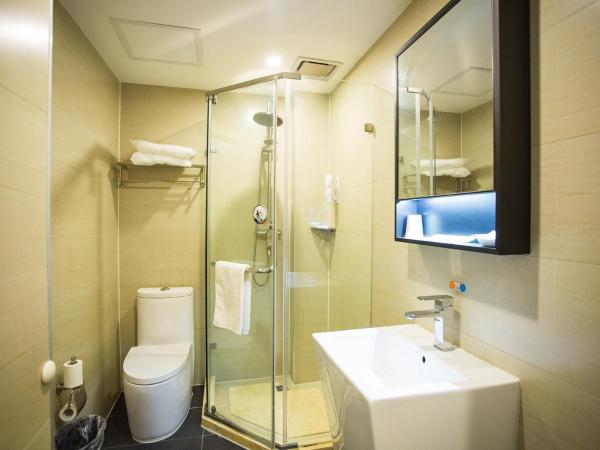 7Days Premium Beijing International Trade Jinsong Subway Station Branch : photo 4 de la chambre réservée aux citoyens de chine continentale - chambre lits jumeaux