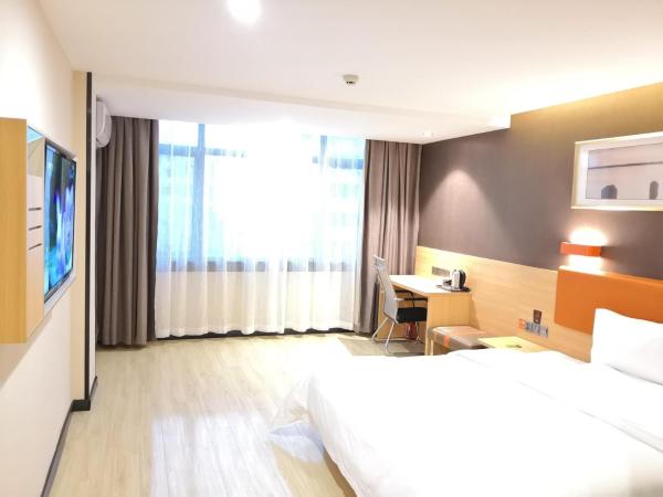 7 Days Premium Sanya Bay Haiyue Plaza Foreign Trade Road Food Street Branch : photo 1 de la chambre chambre supérieure lit queen-size