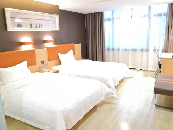 7 Days Premium Sanya Bay Haiyue Plaza Foreign Trade Road Food Street Branch : photo 1 de la chambre chambre lits jumeaux supérieure