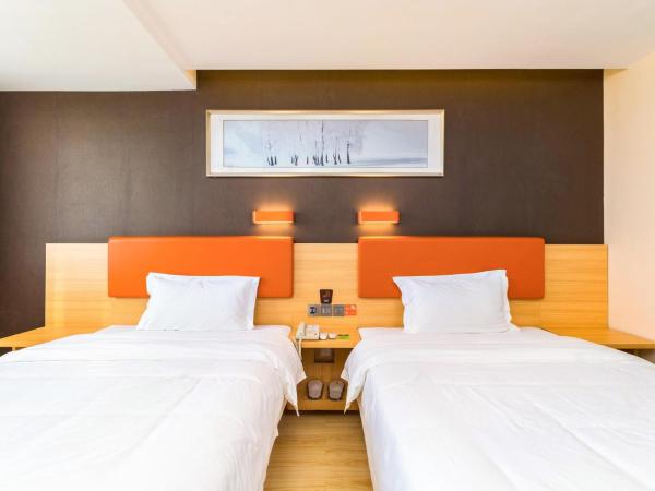 7 Days Premium Sanya Bay Haiyue Plaza Foreign Trade Road Food Street Branch : photo 1 de la chambre chambre lits jumeaux de luxe premium