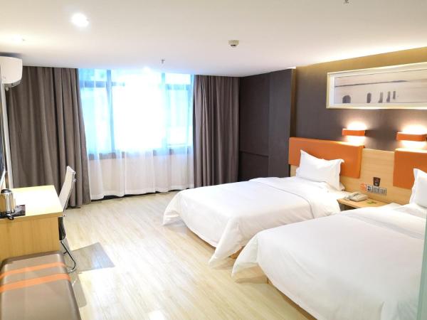 7 Days Premium Sanya Bay Haiyue Plaza Foreign Trade Road Food Street Branch : photo 2 de la chambre chambre lits jumeaux de luxe premium