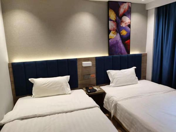 7Days Premium Guangzhou Guangyuan Coach Station Branch : photo 1 de la chambre chambre lits jumeaux supérieure