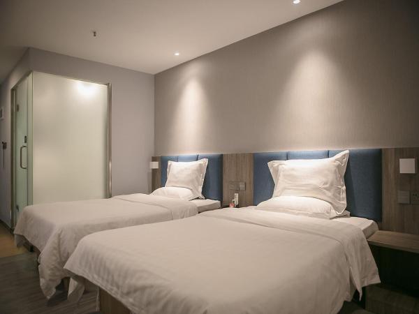 7Days Premium Shenzhen Zhuzilin Subway Station : photo 1 de la chambre chambre lits jumeaux de luxe premium