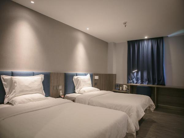 7Days Premium Shenzhen Zhuzilin Subway Station : photo 2 de la chambre chambre lits jumeaux de luxe premium