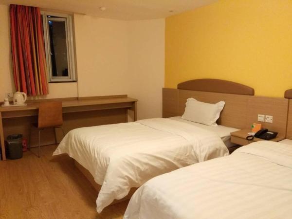 7Days Inn WuHan Road JiQing Street : photo 2 de la chambre chambre affaires lits jumeaux